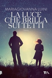 La luce che brilla sui tetti - Librerie.coop La luce che brilla sui tetti - Librerie.coop